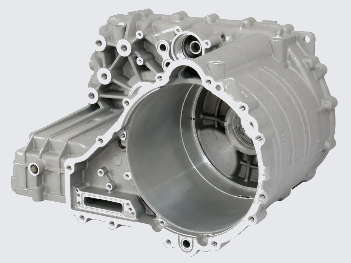 Aluminum housing with a large precision bore, a connector hole and a ring of mounting holes