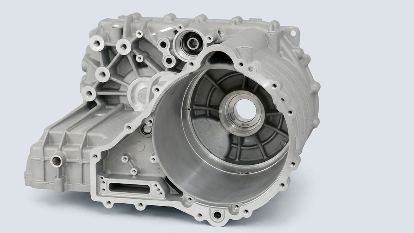 Aluminum EV motor housing with precision bores and a large sealing face