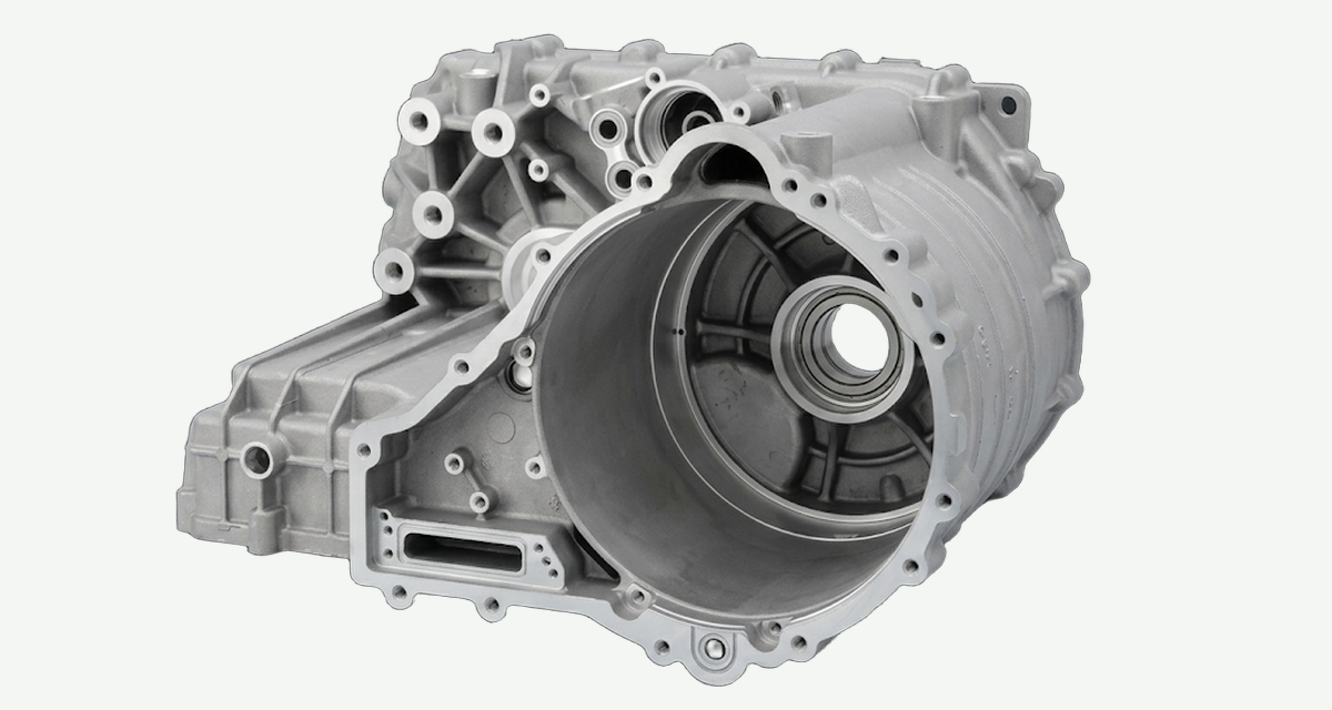 Aluminum EV e-axle housing with a large circular bore and stepped bearing seats