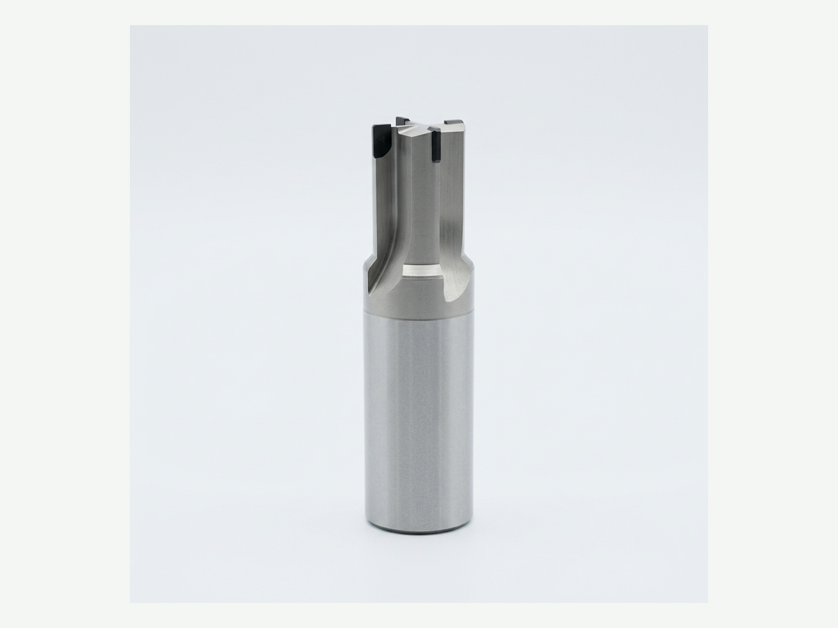 Four-flute PCD-tipped reamer, tip to shank on light gray background